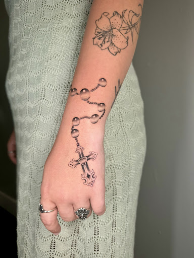 Explore tattoo ideas for breast cancer ribbon, creative tattoo ideas in San Antonio, available at Ink & Iron Tattoos & Piercings