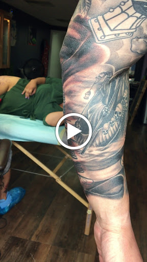 Explore sunflower thigh tattoo ideas, creative tattoo ideas in Chapel Hill, available at Golden Falcon Tattoo and Piercing