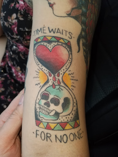 Explore clock tattoo ideas for females, creative tattoo ideas in Yorktown, available at Army Navy Tattoo