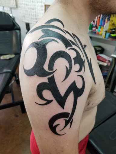 Tattoo Shop «Atomic Tattoos and Piercing», reviews and photos, 2850 Curry Ford Rd, Orlando, FL 32806, USA