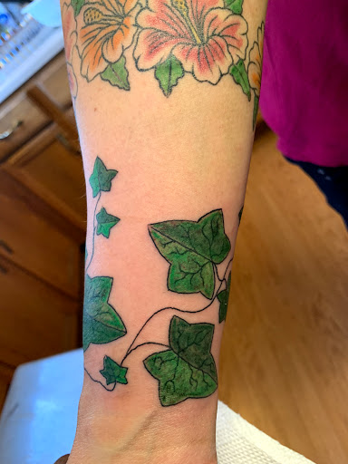 Explore sunrise tattoo ideas, creative tattoo ideas in Cape Coral, available at UNRIVALED INK