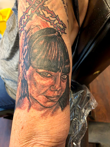 Explore tattoo ideas womens thigh, creative tattoo ideas in Seymour, available at American Gypsy Tattoo Corp.