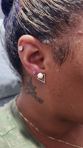 Explore hand tattoo ideas for man, creative tattoo ideas in Marysville, available at Hawaiian Touch Piercing Co.