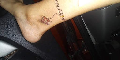 Explore mens inner bicep tattoo ideas, creative tattoo ideas in Milledgeville, available at Pair-O-Dice