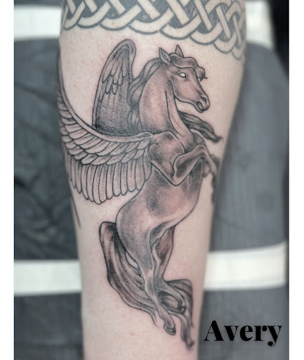 Explore hood tattoo ideas, creative tattoo ideas in Benton, available at Relics Tattoo Studio