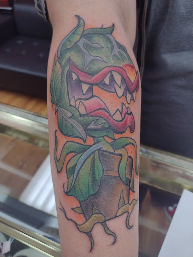 Tattoo Shop «Psychopathic Ink Tattoo & Piercings», reviews and photos, 129 E Beaufort St, Normal, IL 61761, USA