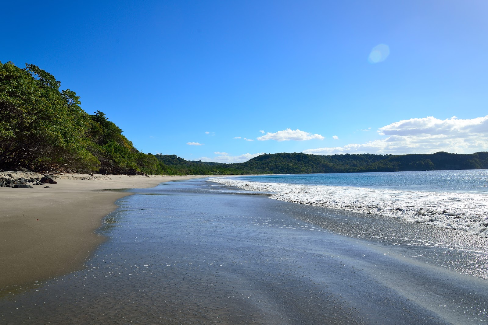 Foto de Cabuyal beach com areia bege fina superfície