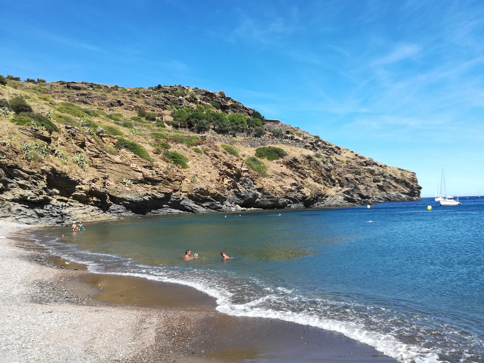 Fotografie cu Platja de Joncols și așezarea