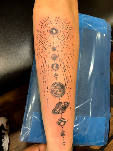 Explore tattoo ideas for my son's name, creative tattoo ideas in Cape Coral, available at UNRIVALED INK