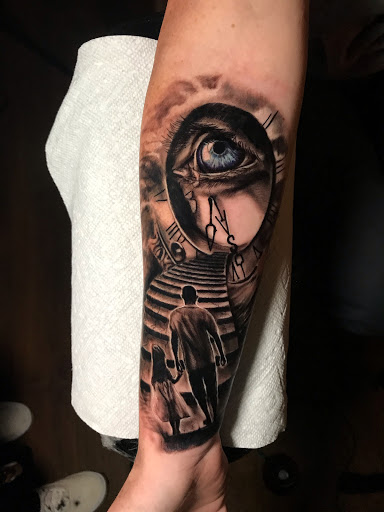 Explore arctic monkeys tattoo ideas, creative tattoo ideas in Johnson City, available at Gold Cross Tattoo Co.