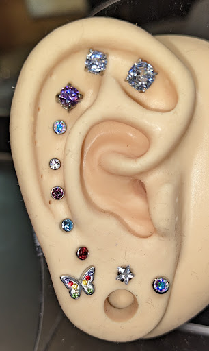 Explore ladies chest tattoo ideas, creative tattoo ideas in Minocqua, available at Lotus Piercing