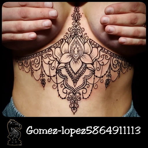 Find lion hand tattoo ideas for men for your next unique tattoo in Warren at Dark Horse Tattoo Co. LLC.