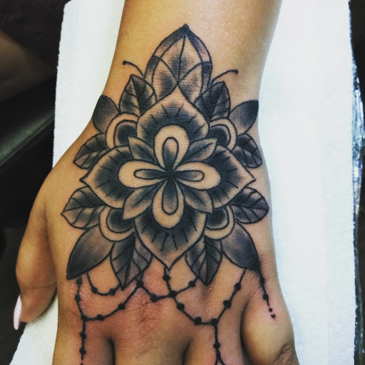 Explore name cover up tattoo ideas, creative tattoo ideas in Longview, available at Anchor Down Tattoo and Piercing