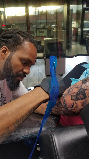 Find mom of 4 tattoo ideas for your next unique tattoo in Anchorage at SDITATTOO, LLC