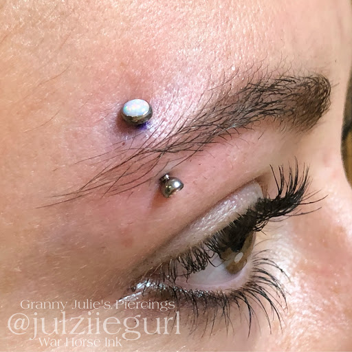 Explore tattoo name placement ideas, creative tattoo ideas in Kent, available at War Horse Ink