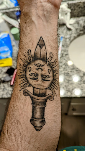 Explore memorial cross tattoo ideas, creative tattoo ideas in Kannapolis, available at Ink Station Tattoo Studio