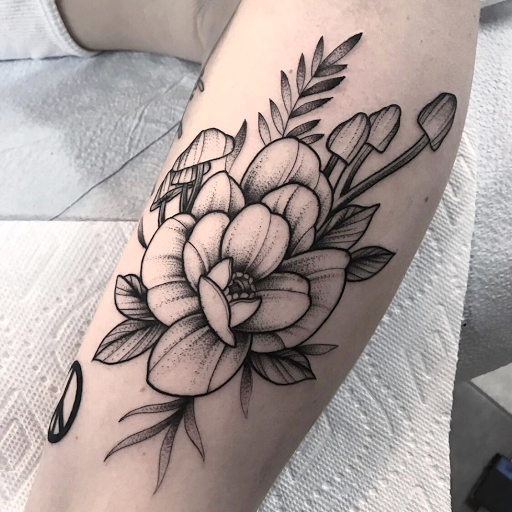 Explore broken heart tattoo ideas, creative tattoo ideas in Denver, available at Think Tank Tattoo