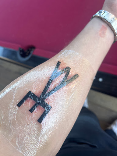Explore top of hand tattoo ideas, creative tattoo ideas in San Antonio, available at Twisted Tattoo