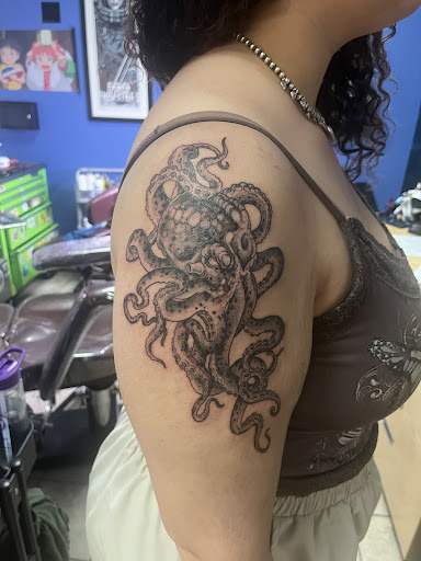Explore ed hardy tattoo ideas, creative tattoo ideas in Lawrence, available at Red 5 Tattoo