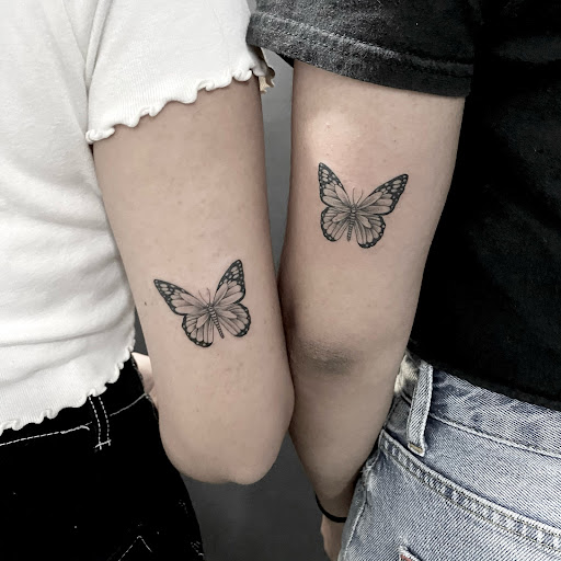 Explore dad and daughter tattoo ideas, creative tattoo ideas in New York, available at UPLIFT TATTOO & PIERCING NYC