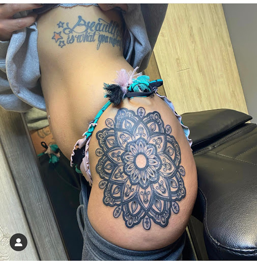 Explore black power tattoo ideas, creative tattoo ideas in Indianapolis, available at Inkfam Tattoo Gallery