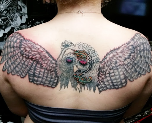 Explore grandson tattoo ideas, creative tattoo ideas in Erie, available at EliKingInk