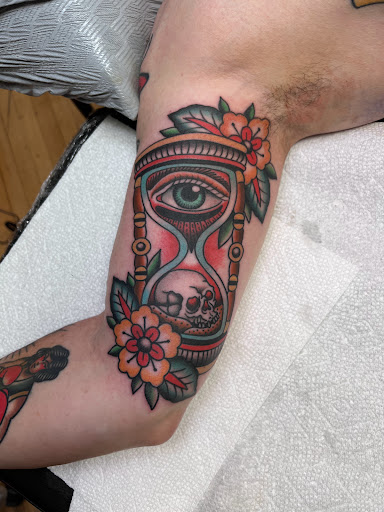 Explore sand dollar tattoo ideas, creative tattoo ideas in Wakefield, available at Wakefield Tattoo