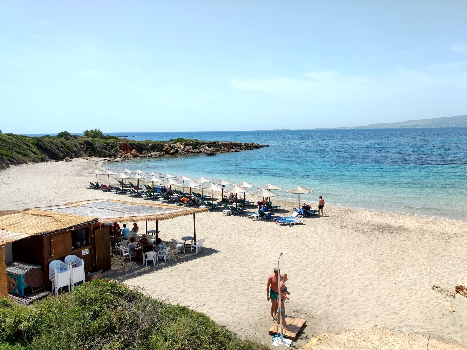 Zdjęcie Eglina beach z powierzchnią jasnozielona woda