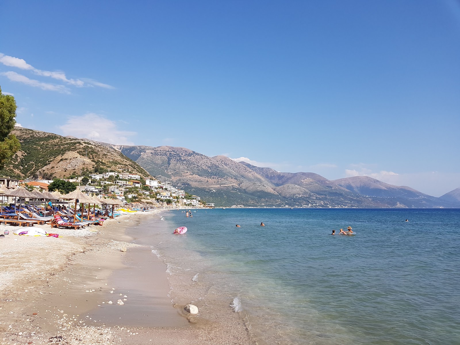 Photo of Qeparo beach with light sand &  pebble surface