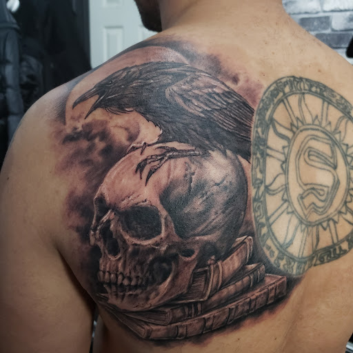 Explore foo fighters tattoo ideas, creative tattoo ideas in Woodside, available at Fiction Tattoo Inc.