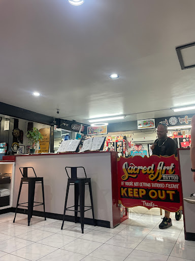 Find cat tattoo ideas simple for your next unique tattoo in Honolulu at Sacred Art Tattoo Waikiki