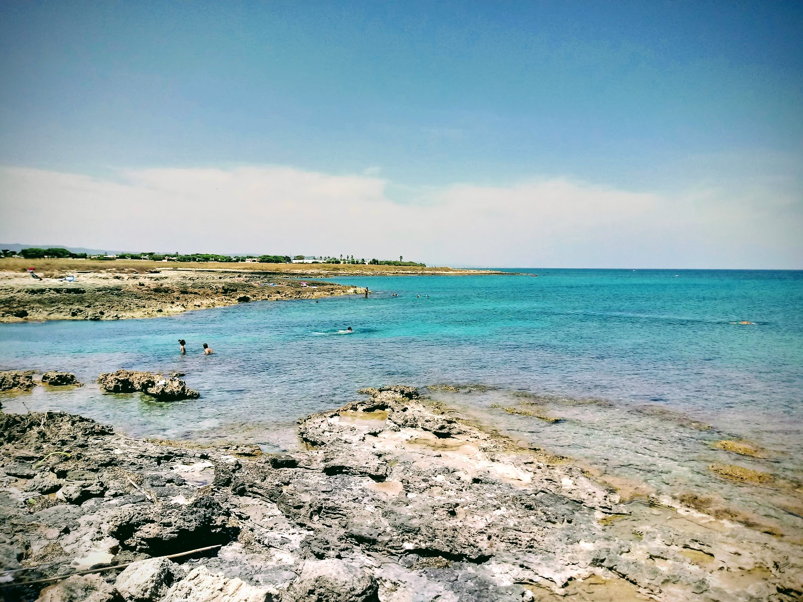 Cala Diana Marina'in fotoğrafı kirli temizlik seviyesi ile