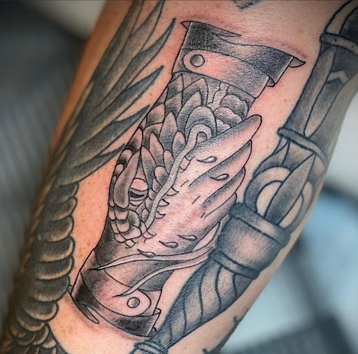 Find dragon tattoo ideas male for your next unique tattoo in Charleston at The Edge Tattoo Studio