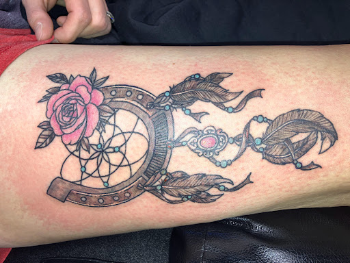 Explore king tattoo ideas, creative tattoo ideas in Kewanee, available at Splat Ink tattoos and piercings