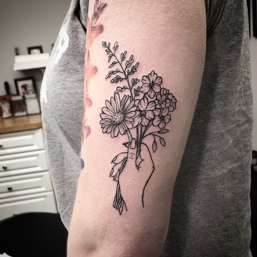 Explore leg tribal tattoo ideas, creative tattoo ideas in Albany, available at Lark Street Tattoo