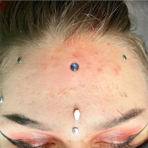 Explore matching tattoo ideas for husband and wife, creative tattoo ideas in Charleston, available at Exotic Impressions Body Piercing