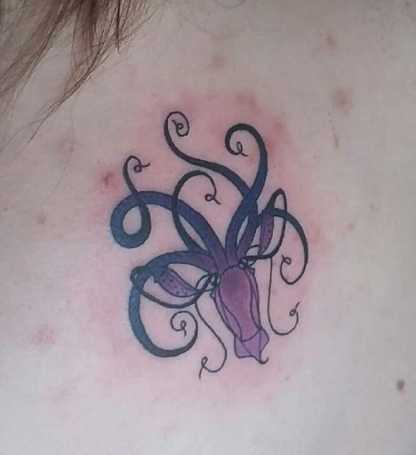 Explore parkinson's tattoo ideas, creative tattoo ideas in Englewood, available at Revolution Studios