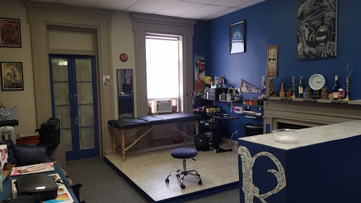 Explore broken glass tattoo ideas, creative tattoo ideas in Utica, available at Redemption Tattoo Company