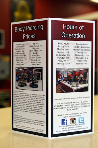 Explore red cardinal tattoo ideas, creative tattoo ideas in Katy, available at Artistic Impressions Tattoo Studio