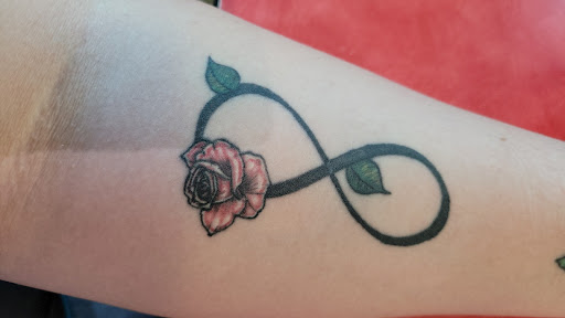 Explore peony tattoo ideas, creative tattoo ideas in Greenville, available at Bomb Ink