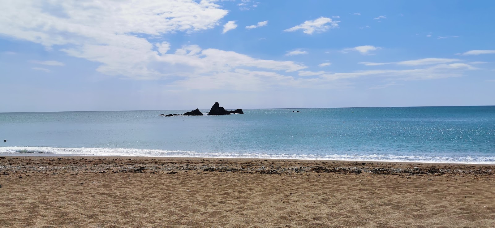 Garrarus Beach'in fotoğrafı çok temiz temizlik seviyesi ile