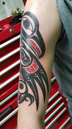 Explore guardian angel tattoo ideas, creative tattoo ideas in Norfolk, available at Voodoo Tattoo & Body Piercing, LLC