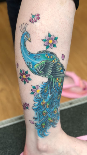 Tattoo Shop «Nine Lives Tattoo», reviews and photos, 61 N Holladay Dr, Seaside, OR 97138, USA