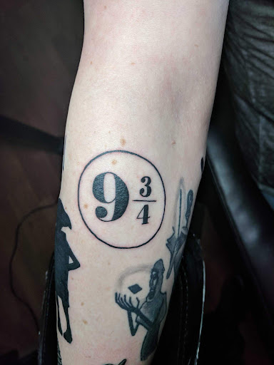 Explore fist tattoo ideas, creative tattoo ideas in Renton, available at Sacred Soul Tattoo