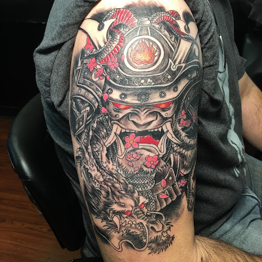 Explore black and grey half sleeve tattoo ideas, creative tattoo ideas in Arcadia, available at Peter Gunz Tattoo Studio