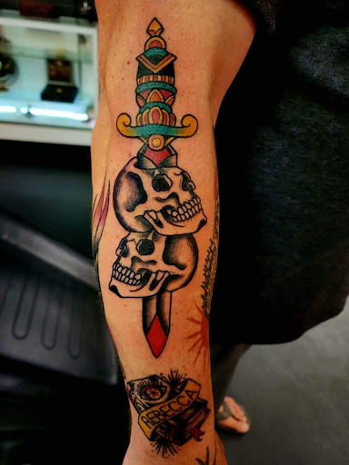 Explore deceased dog tattoo ideas, creative tattoo ideas in Redding, available at Dominant Ink