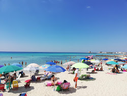 Foto van Spiaggia di Torre Lapillo met enigszins schoon niveau van netheid
