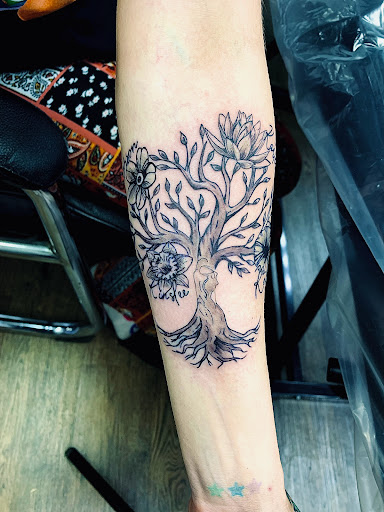 Explore bow and arrow tattoo ideas, creative tattoo ideas in Lake City, available at Crooked Spines Tattoo Studio