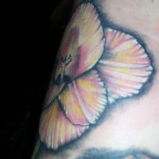 Explore tattoo idea for women, creative tattoo ideas in Orange, available at Lincoln Avenue Tattoo