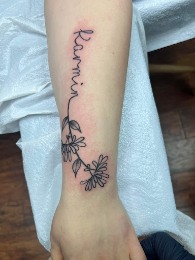 Explore kiss lip tattoo ideas, creative tattoo ideas in Adrian, available at Good Life Tattoo Co.